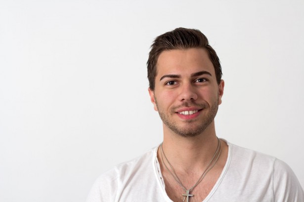 portrait of a young attractive brunette likeable man