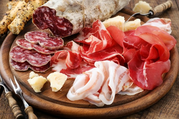 italian meat platter - prosciutto ham, bresaola, pancetta, salami and parmesan
