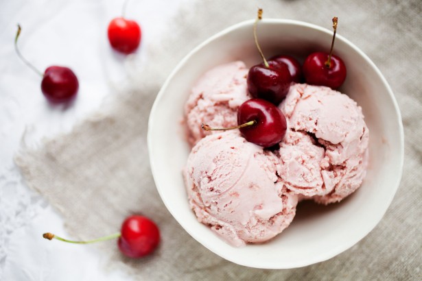 homemade cherry ice cream on table