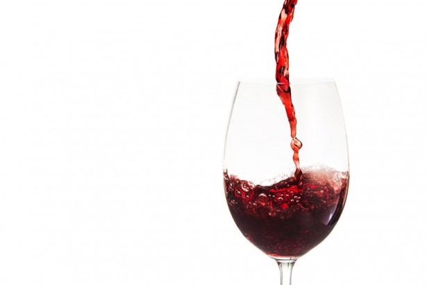 48820015 - glass with red wine isolated on white background