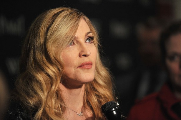 NEW YORK, NY - DECEMBER 04: Madonna attends the Cinema Society & Piaget screening of "W.E." at The Museum of Modern Art on December 4, 2011 in New York City. (Photo by Stephen Lovekin/Getty Images)